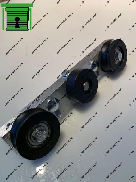 Astroslide 2000 carriage wheel assembly
